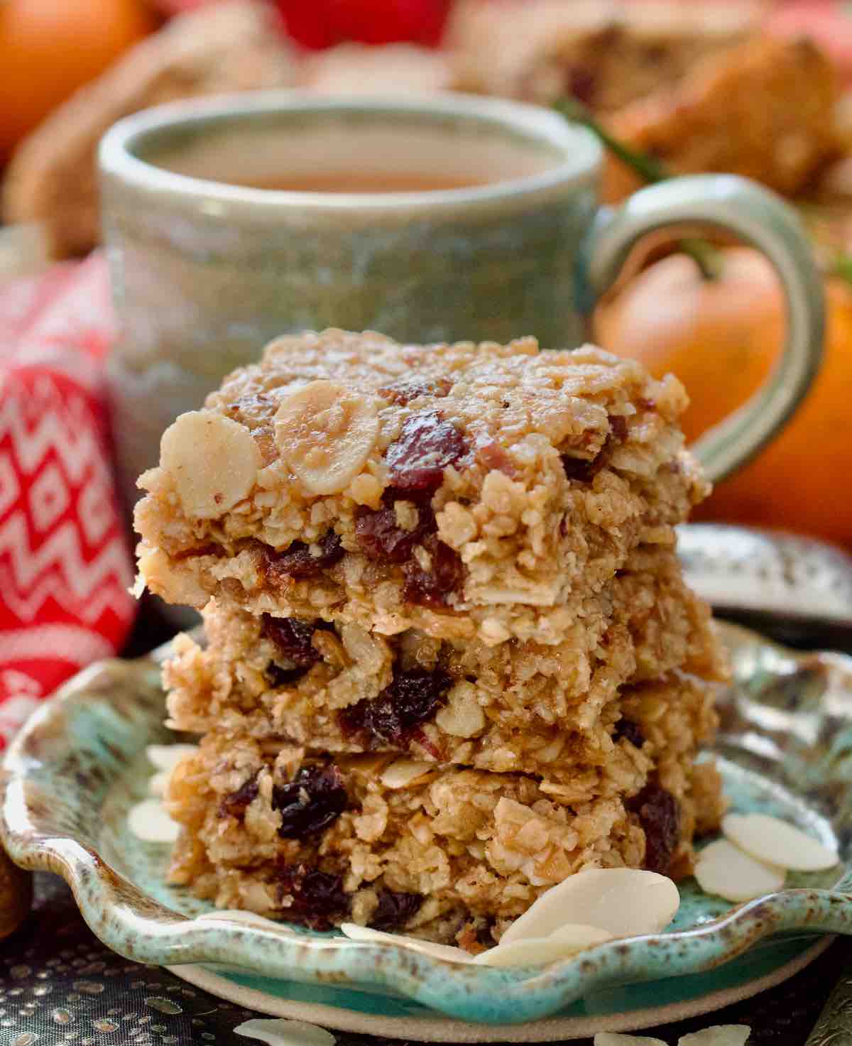Close up of three flapjacks on a plate.