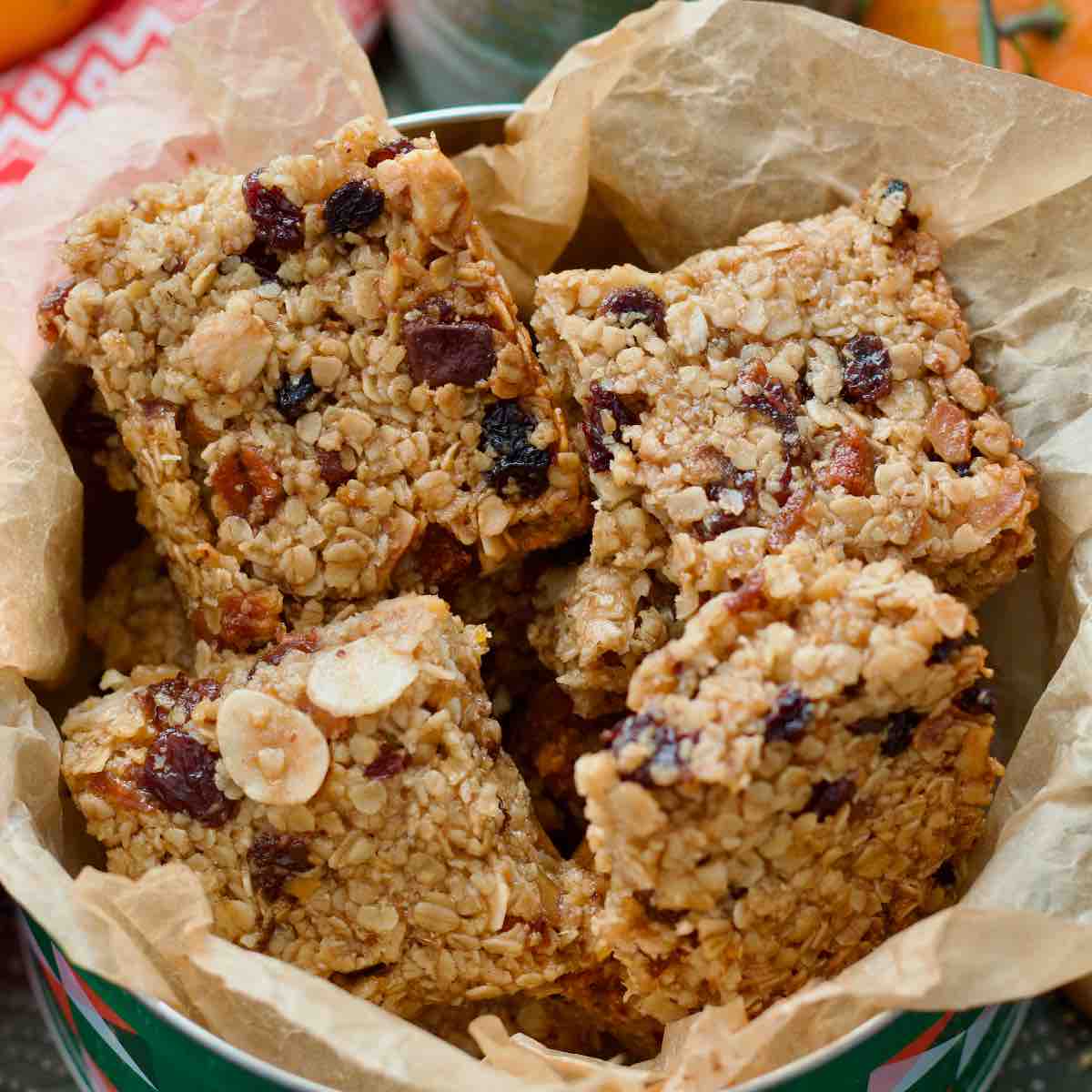 Close up of mincemeat flapjacks in a tin.