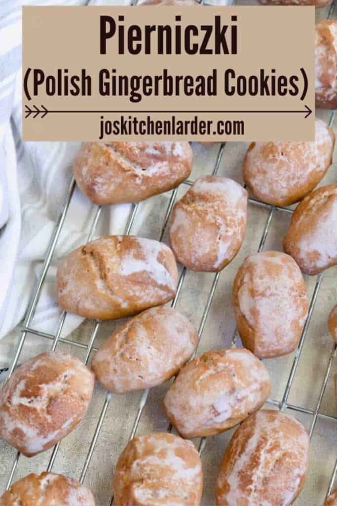 Iced pierniczki drying on a cooling rack.