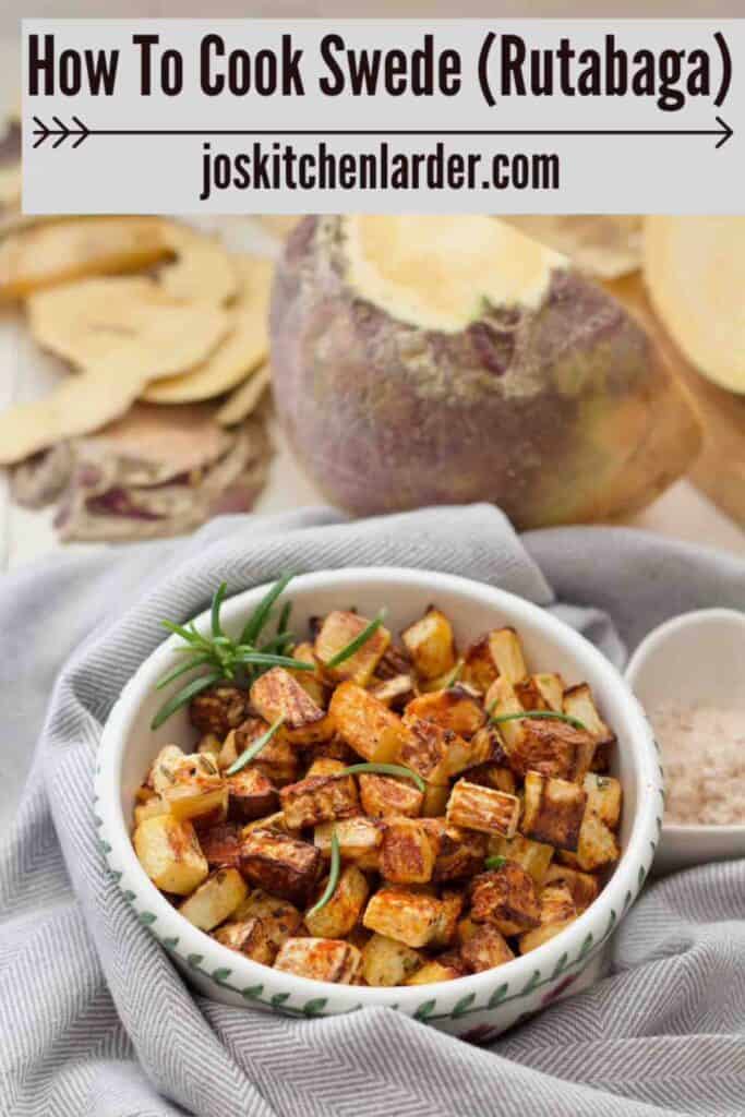 Roasted swede in a dish with raw swede and peelings behind it.