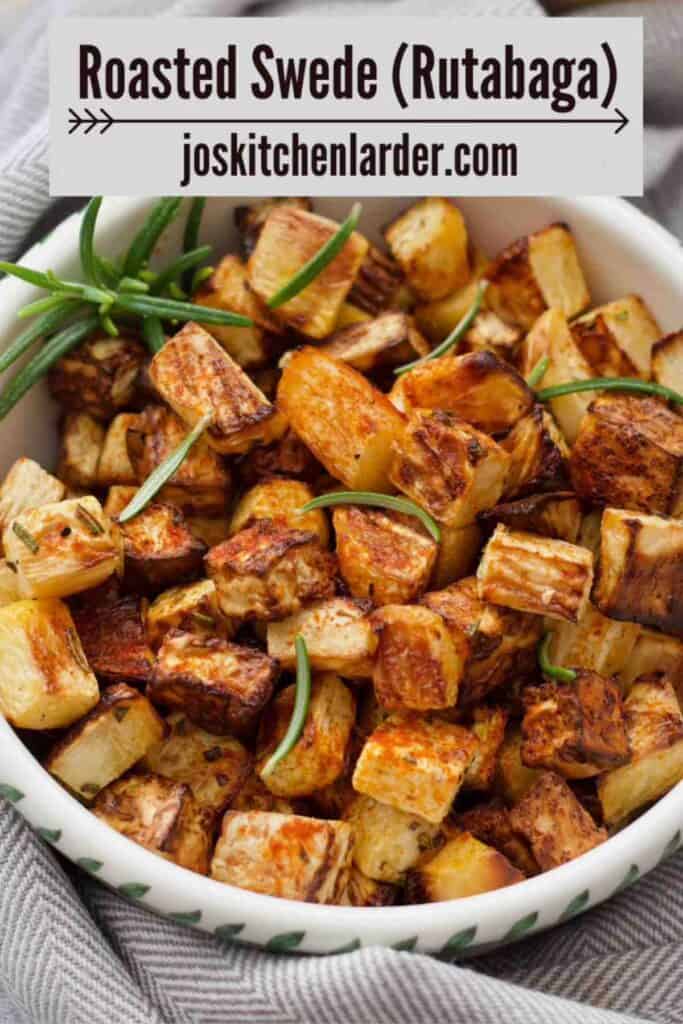 Close up of roasted swede in a serving dish.