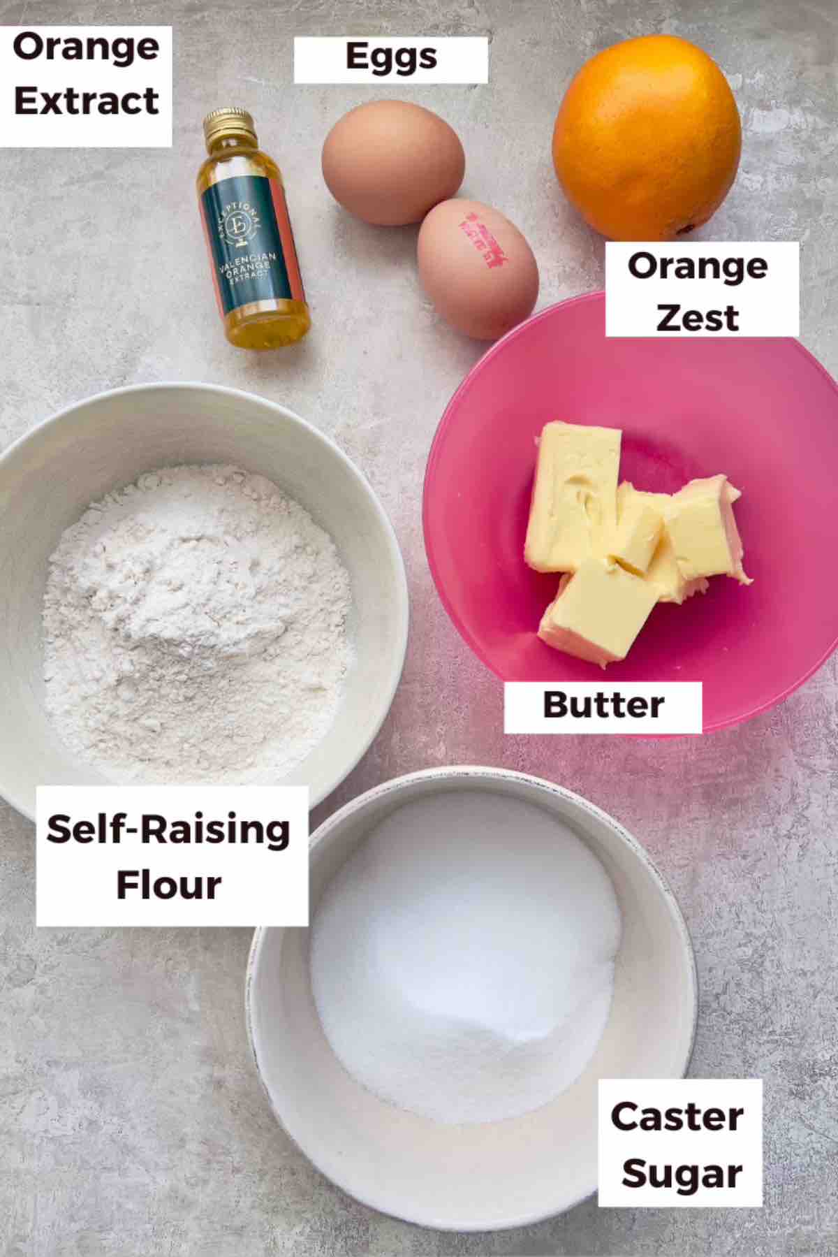 Ingredients for making chocolate orange butterfly cakes.