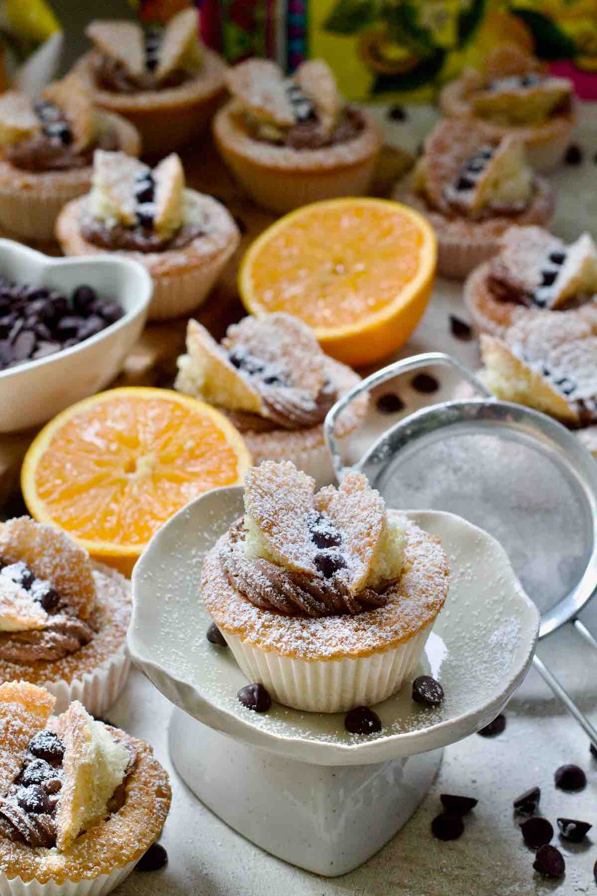 Decorated butterfly cake on a small cake stand.