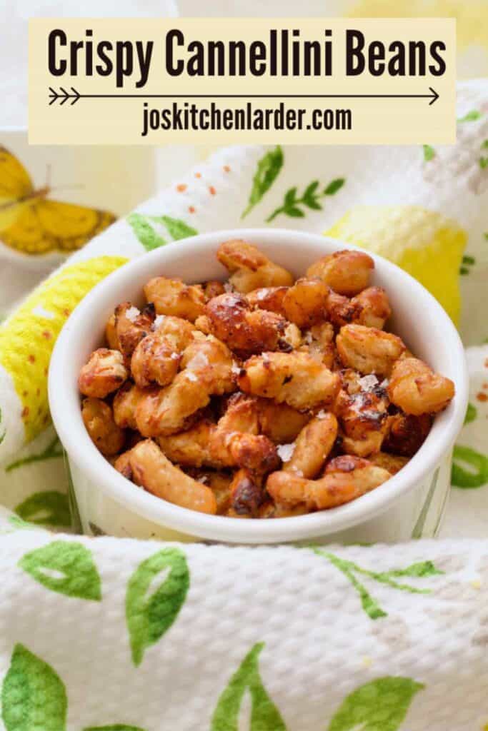 Crispy cannellini beans in a small pot.