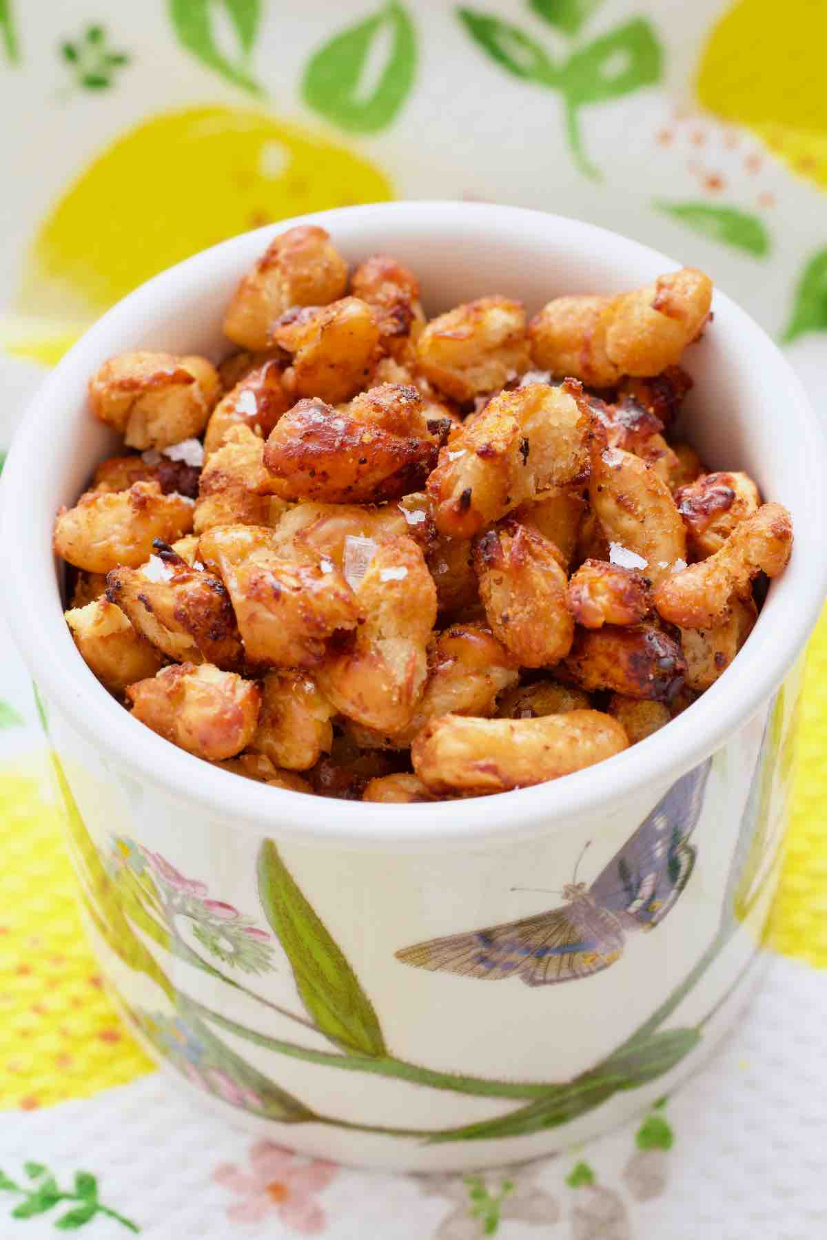 Crispy cannellini beans in a small pot.
