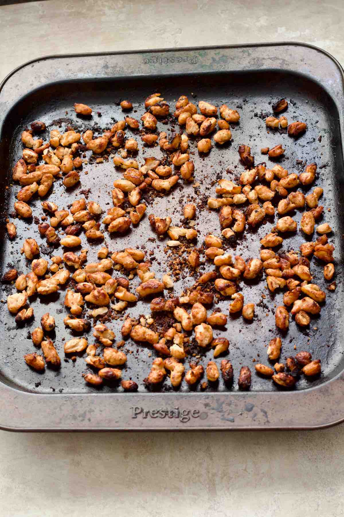 Roasted beans on a baking tray.