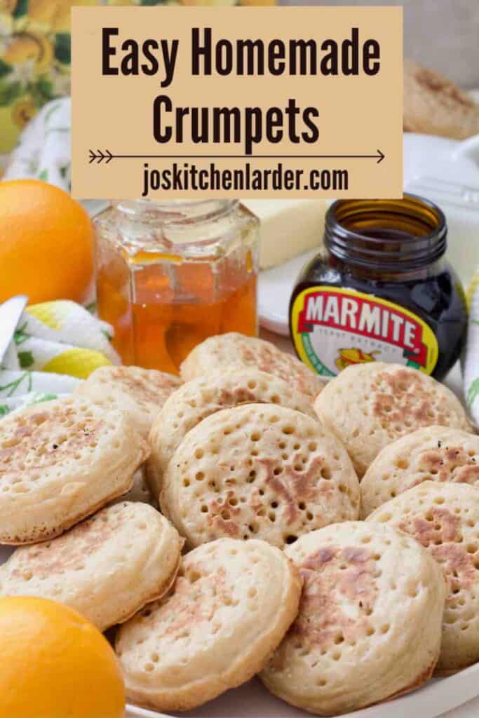 Crumpets forming a ring on a plate with one in the centre.