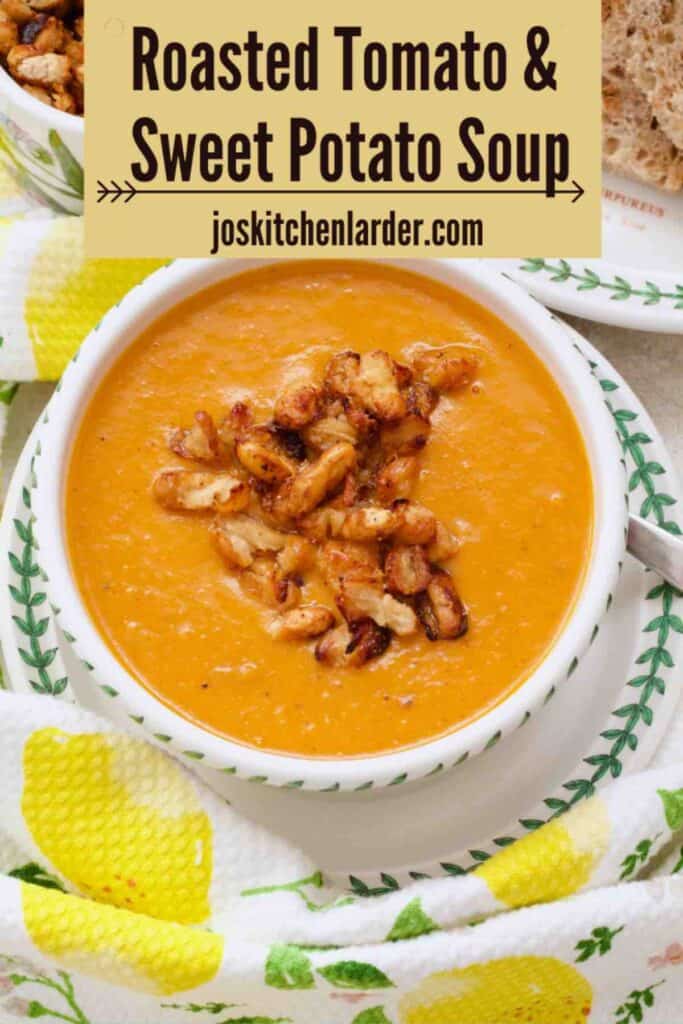 Serving of roasted tomato and sweet potato soup in a bowl.