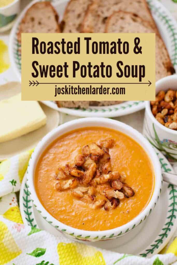 Roasted tomato and sweet potato soup served in a bowl with crispy beans.