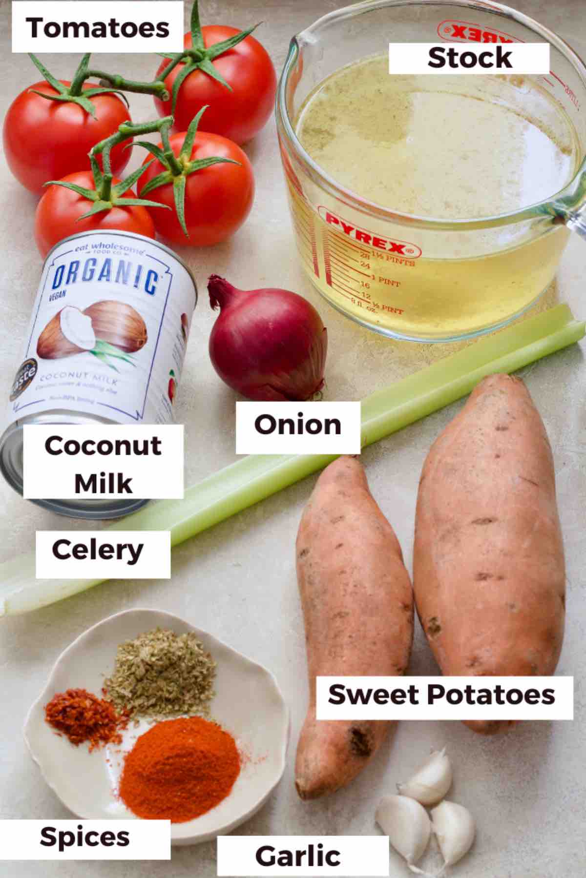 Ingredients for making roasted tomato and sweet potato soup.