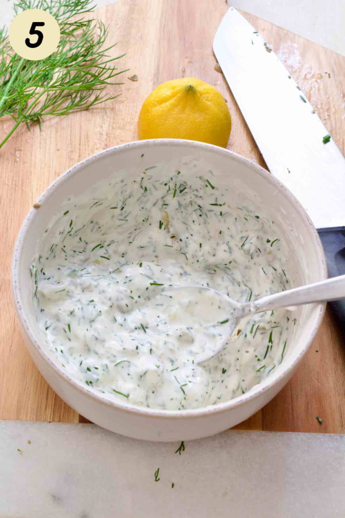 Tartare sauce fully mixed in a bowl.