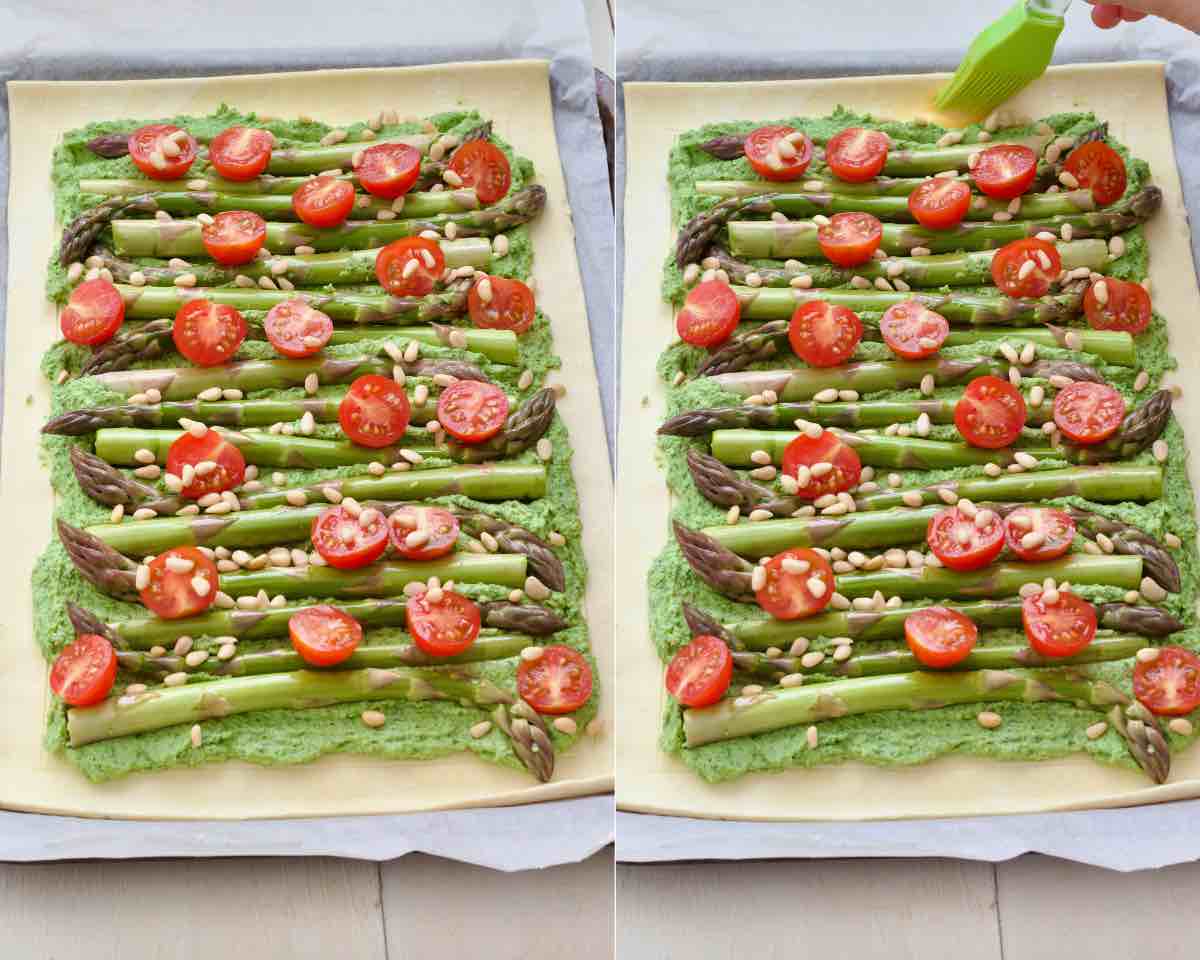 Assembled asparagus tart, puff pastry edge being brushed with egg wash.