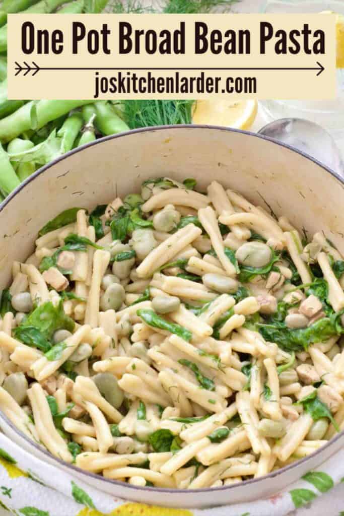 Pot with broad bean pasta, broad bean pods, fresh dill and lemon.