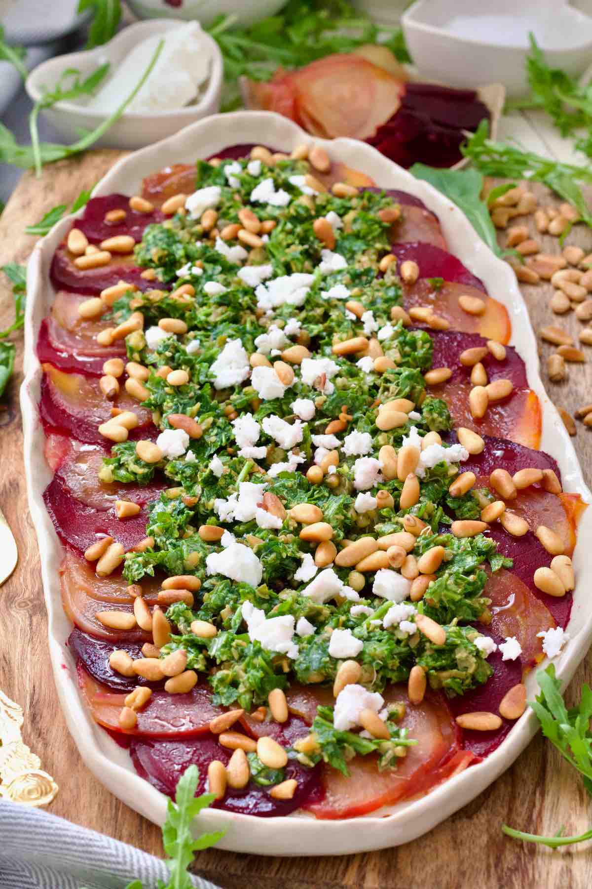 Beetroot carpaccio on a serving platter.