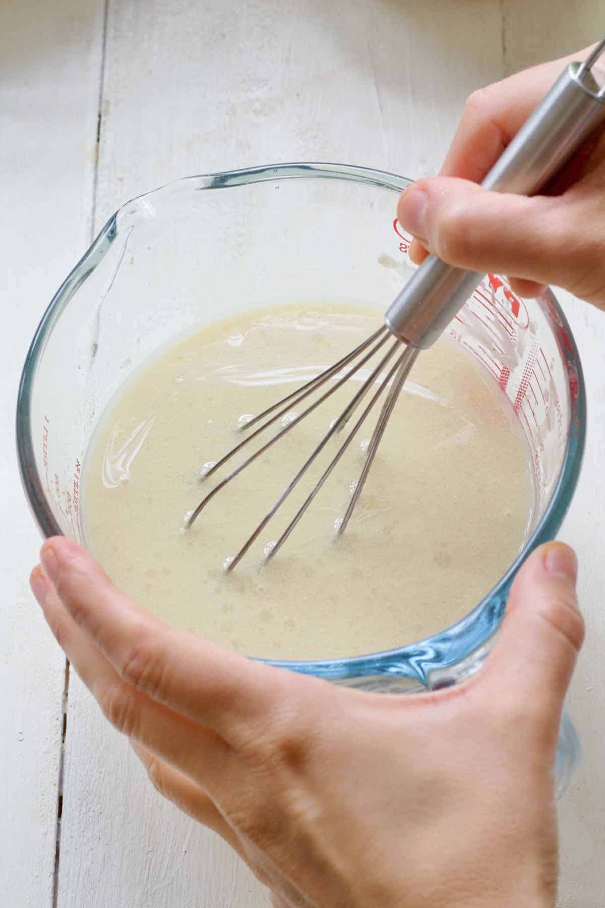 Whisking all the wet ingredients in a jug.
