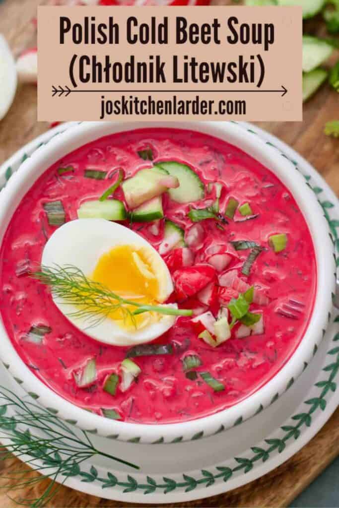 Close up of chłodnik litewski in a serving bowl with garnishes.