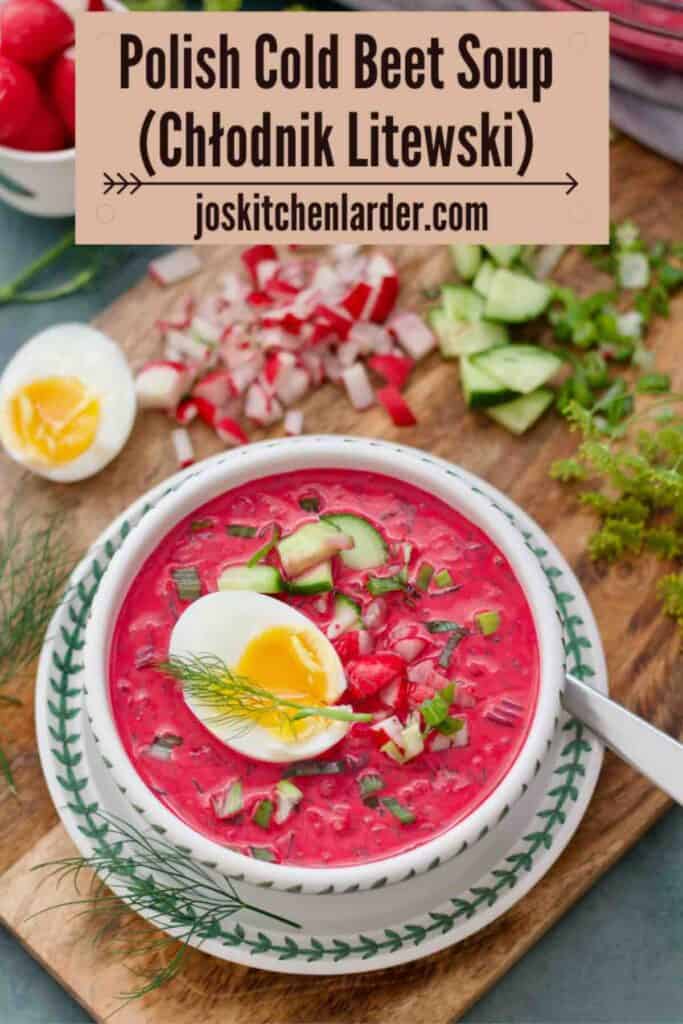 One person serving of Polish cold beet soup topped with jammy egg.