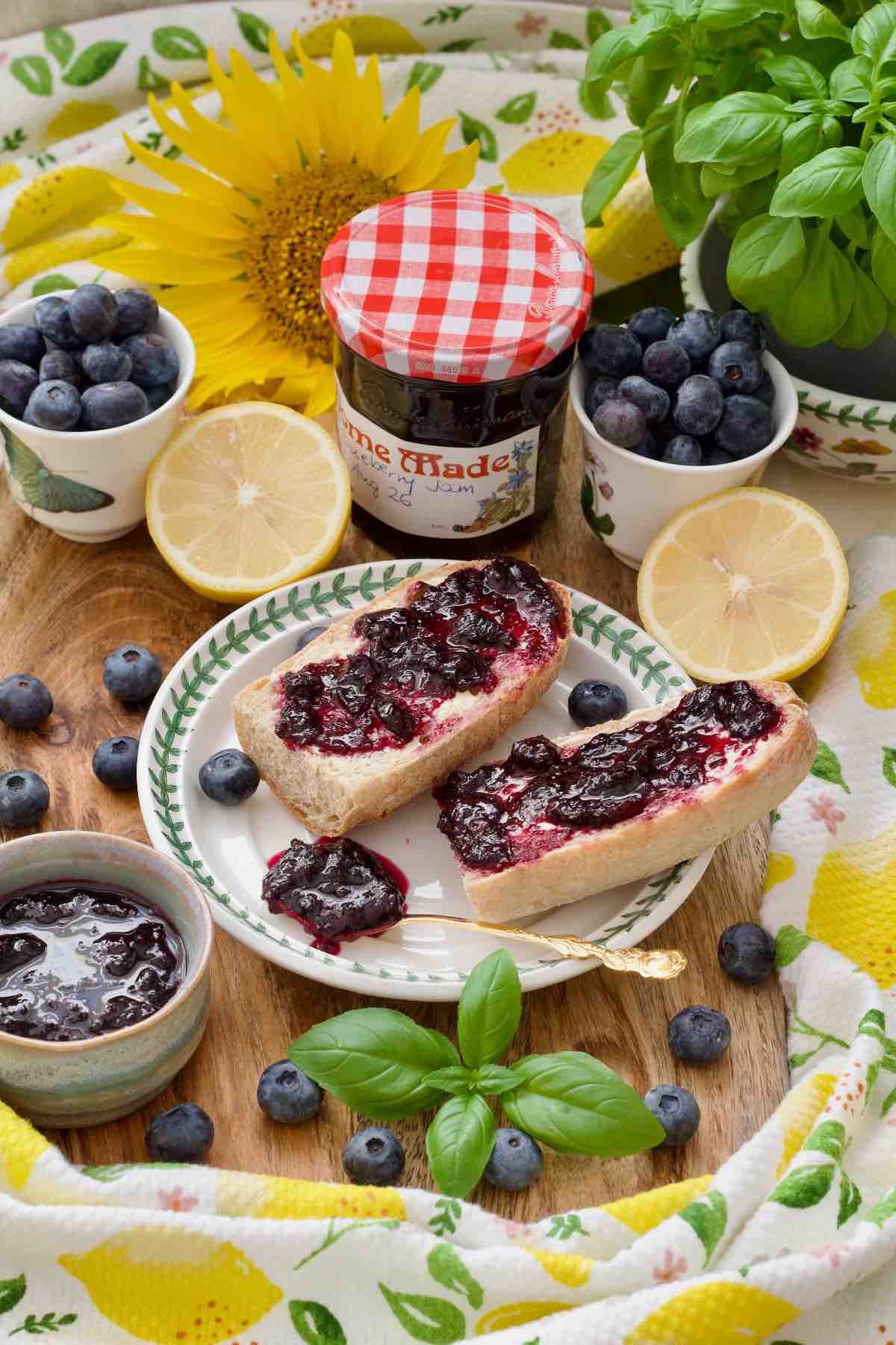 Breakfast display with 2 baguette pieces topped with blueberry jam.