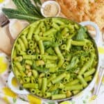 Green pasta in a casserole dish ready to serve.