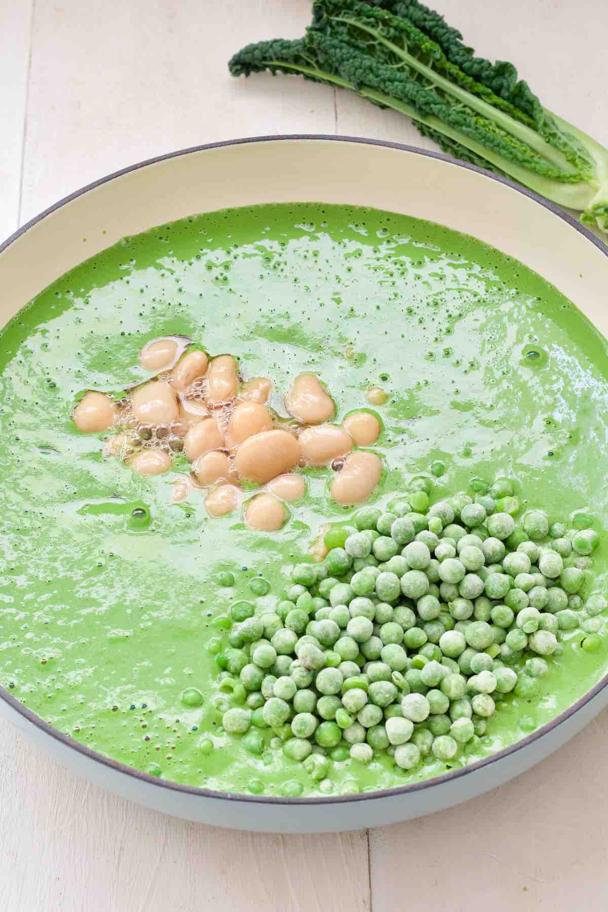 Butter beans and frozen peas added to the green sauce.