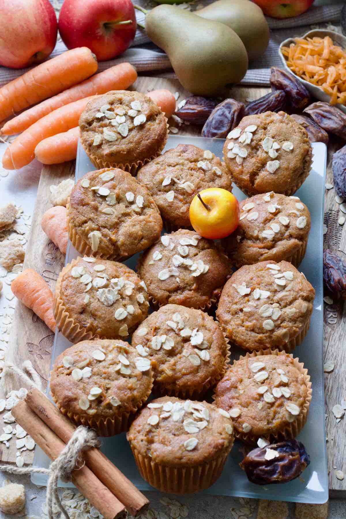 Bird view of a platter full of carrot and date muffins.