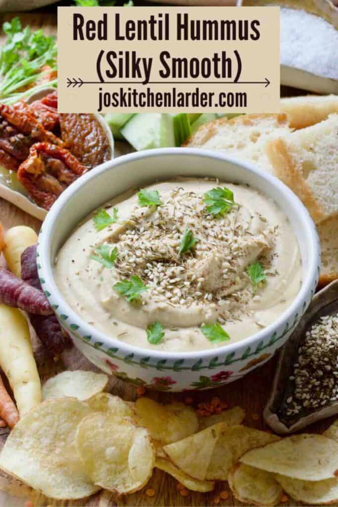 Bowl of red lentil hummus ready for serving.